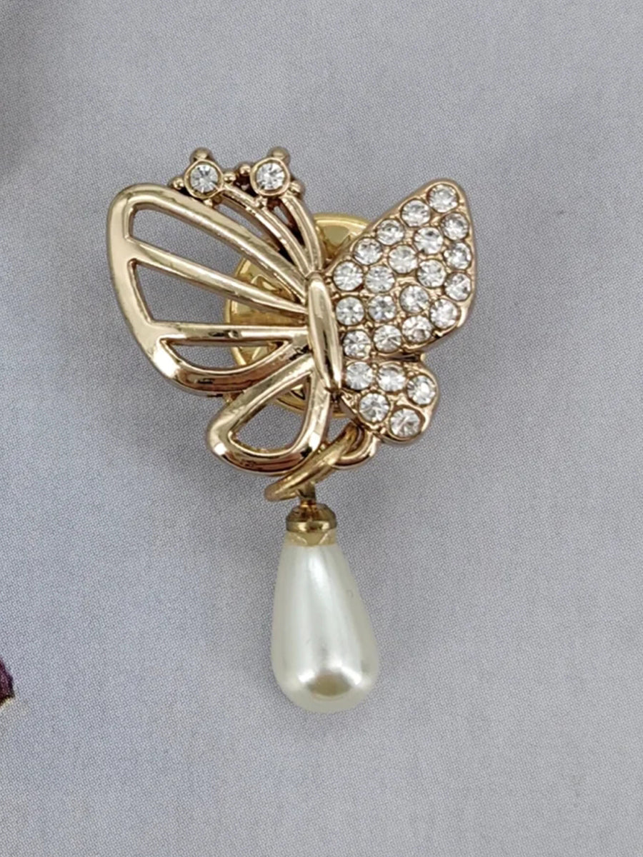 Radiant Butterfly Brooch With Pavé Detailing And Pearl Drop