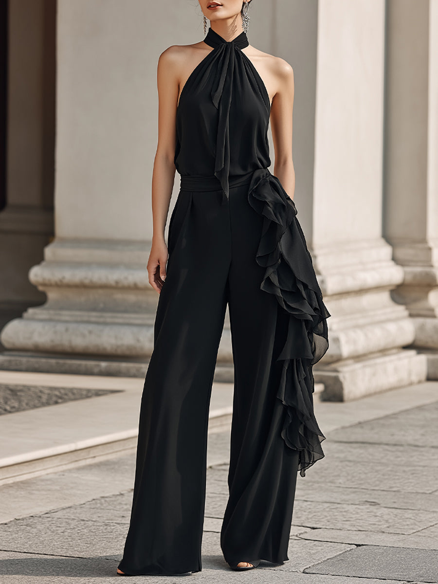 Midnight Chiffon Halter Jumpsuit With Dramatic Side Cascades