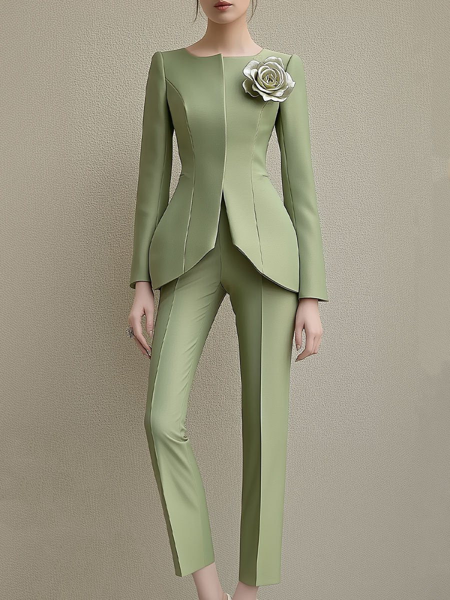 Elegant Green Tailored Suit with Statement Rose