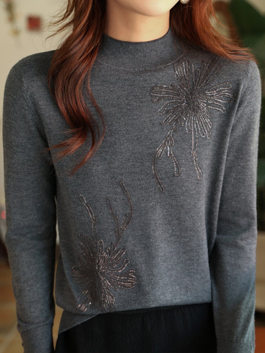 Timeless Sweater with Subtle Floral Details